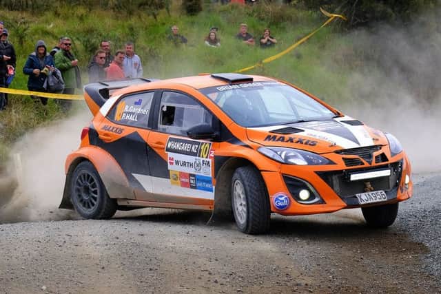 Co-driver Phil Hall, of Mansfield, in action in New Zealand. (PHOTO BY: Geoff Ridder)