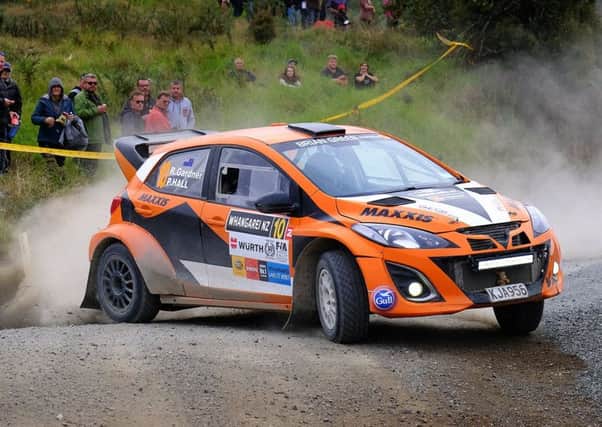Co-driver Phil Hall, of Mansfield, in action in New Zealand. (PHOTO BY: Geoff Ridder)