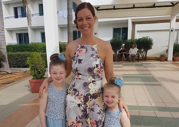 Slimmer Claire Trewick with her two children, Jessica and Jasmine.