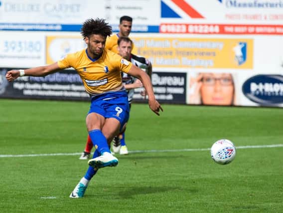 Lee Angol pictured in action for Mansfield Town