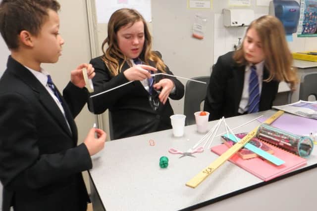 Youngsters at Sutton Community Academy taking part in Science Week.