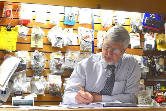 Boss Graham Kirk busy at the helm of Mansfield Garage Doors, the company he founded with his father Ron 50 years ago.