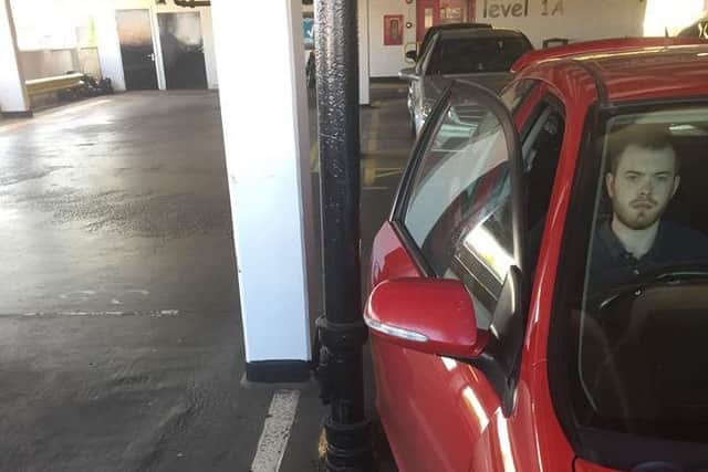 Joe Grant in the parking space