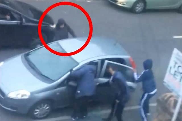 A group of men surrounded the car and began attacking Aqib and his friend.