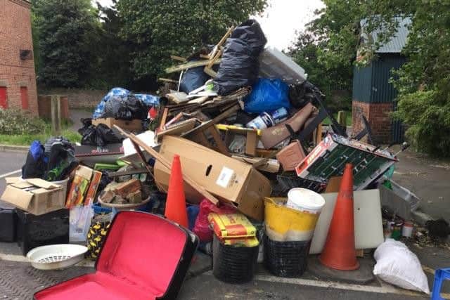 Huthwaite Library site, skip under rubbish. By Cathy Mason