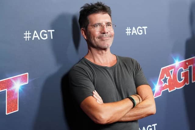 Simon Cowell has broken "parts of his back" following his bike accident (Photo: Rachel Luna/Getty Images)
