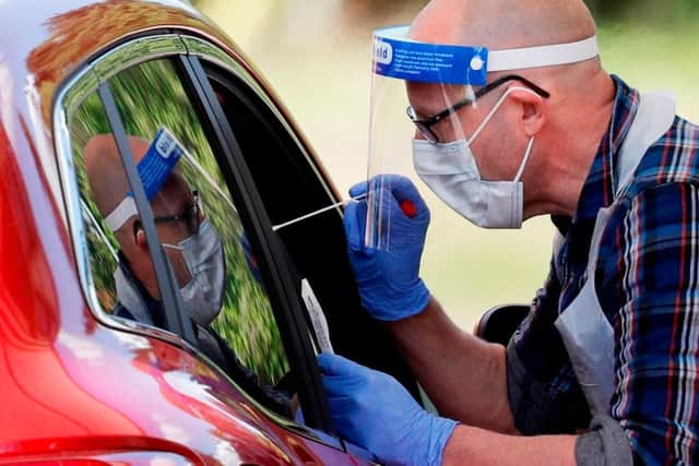 Only those with symptoms should arrange to have a test carried out (Photo: ADRIAN DENNIS/AFP via Getty Images)