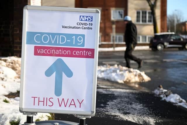The scam poses as an invite to receive a Covid-19 vaccination (Photo: OLI SCARFF/AFP via Getty Images)