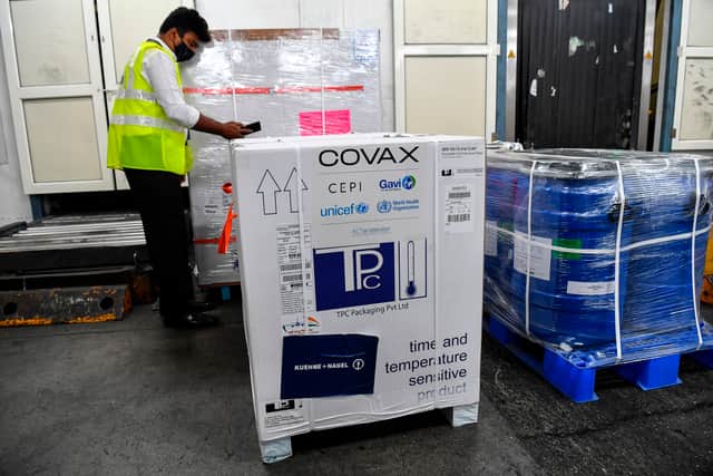 The world’s first Covid vaccine sharing initiative has begun - so poorer countries can receive jabs (Photo by INDRANIL MUKHERJEE/AFP via Getty Images)